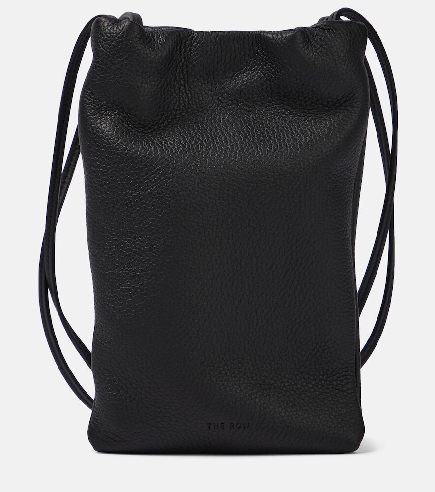The Row Bourse leather phone pouch in black