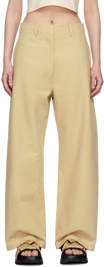 arch the beige long trousers