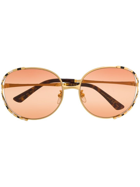 Gucci Eyewear striped frame sunglasses in gold