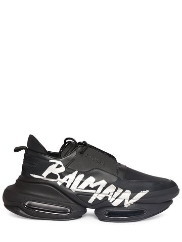 balmain b bold low rubberized leather sneakers in black / silver