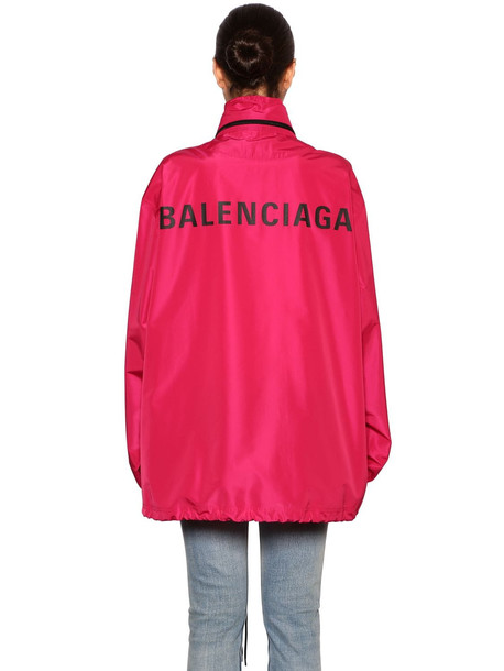 BALENCIAGA Back Logo Hooded Nylon Windbreaker in fuchsia - Wheretoget