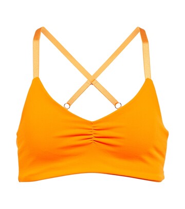 Live The Process Saturn sports bra in orange