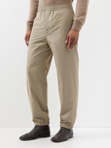 auralee - finx elasticated-waist gabardine trousers - mens - khaki