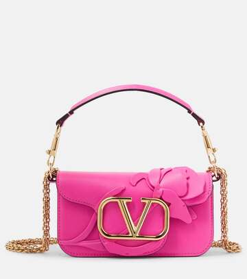 valentino garavani locò small embossed shoulder bag in pink