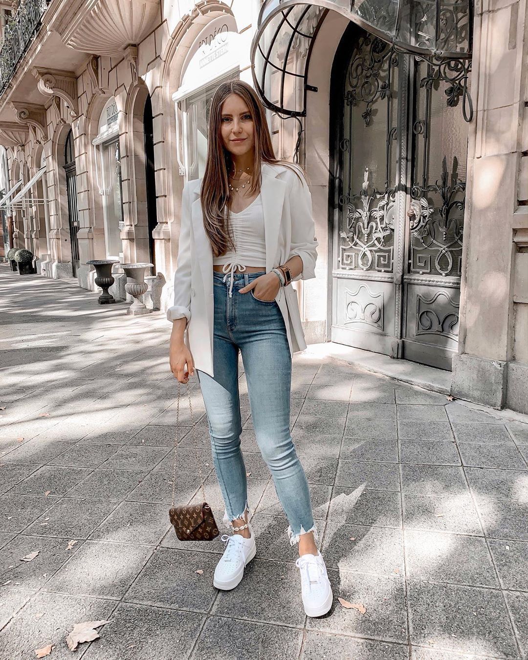 jeans and white sneakers
