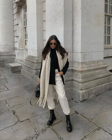 shoes,black boots,ankle boots,white pants,black sweater,scarf,black bag