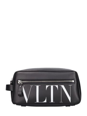 valentino garavani vltn medium leather toiletry bag in black / white