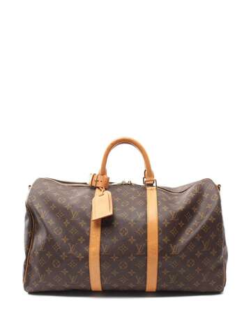 louis vuitton 1999 pre-owned monogram keepall bandouliere 50 travel bag - brown