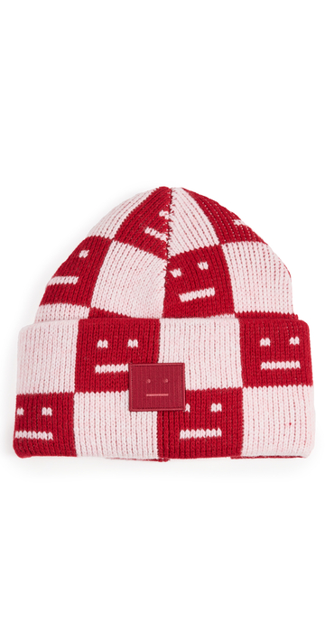 Acne Studios Allover Logo Beanie in pink / red