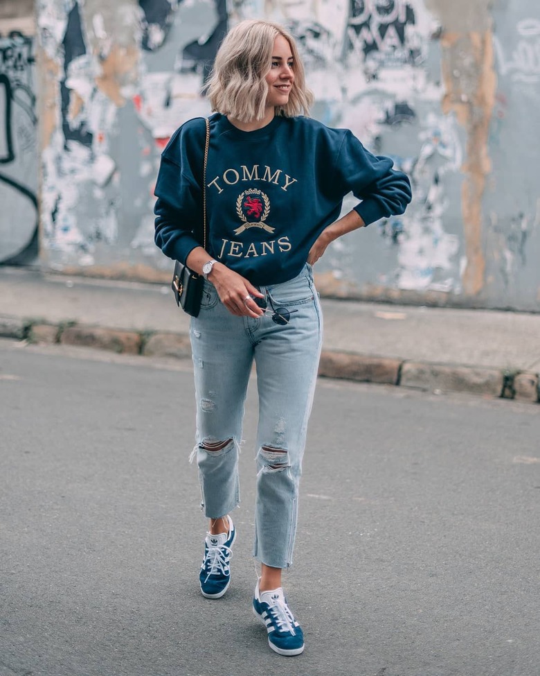 top sweatshirt sneakers adidas cropped jeans ripped jeans levi's black bag