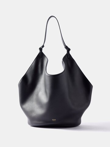 khaite - lotus medium leather tote bag - womens - black