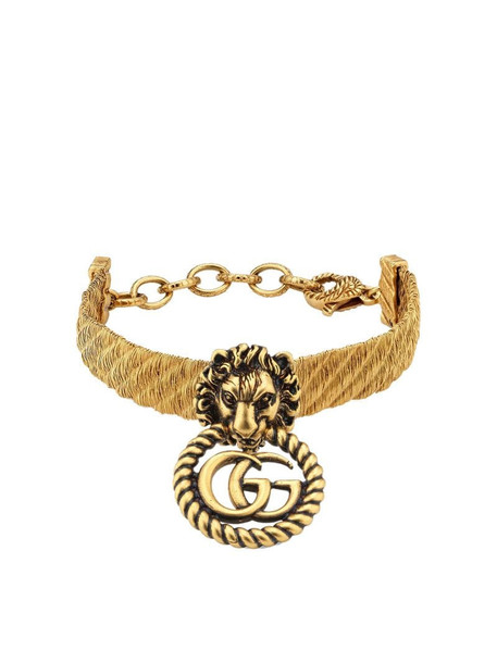 Gucci Lion head bracelet in gold