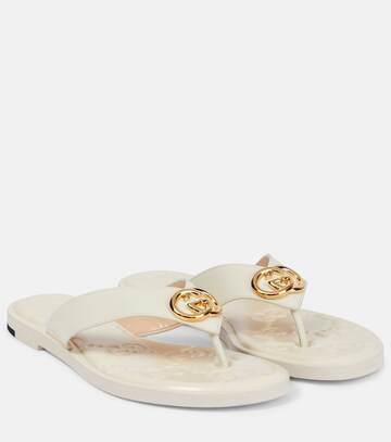 gucci gg leather thong sandals in white