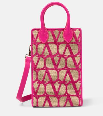valentino garavani toile iconographe leather-trimmed crossbody bag in pink