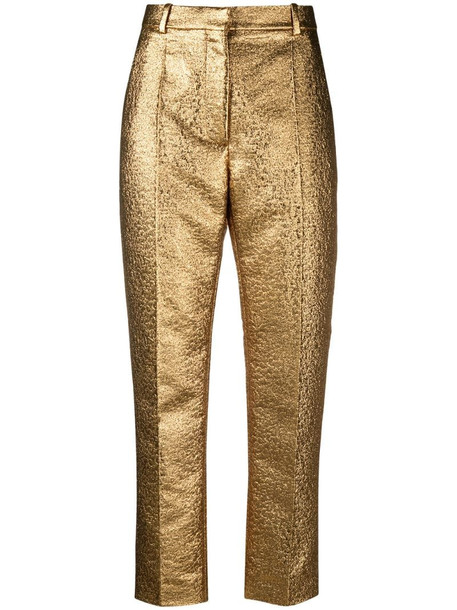 Valentino golden cropped trousers in gold - Wheretoget