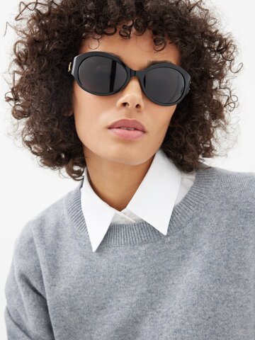 celine eyewear - triomphe oval acetate sunglasses - womens - black