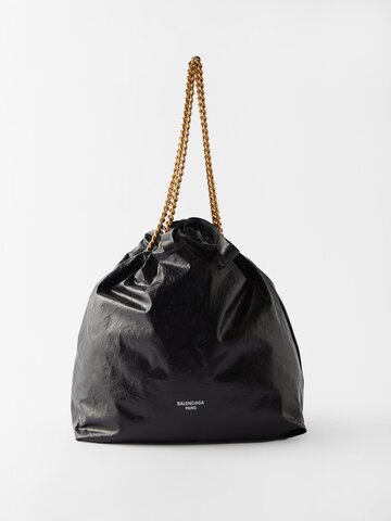 balenciaga - crush m crinkled-leather drawstring tote bag - womens - black
