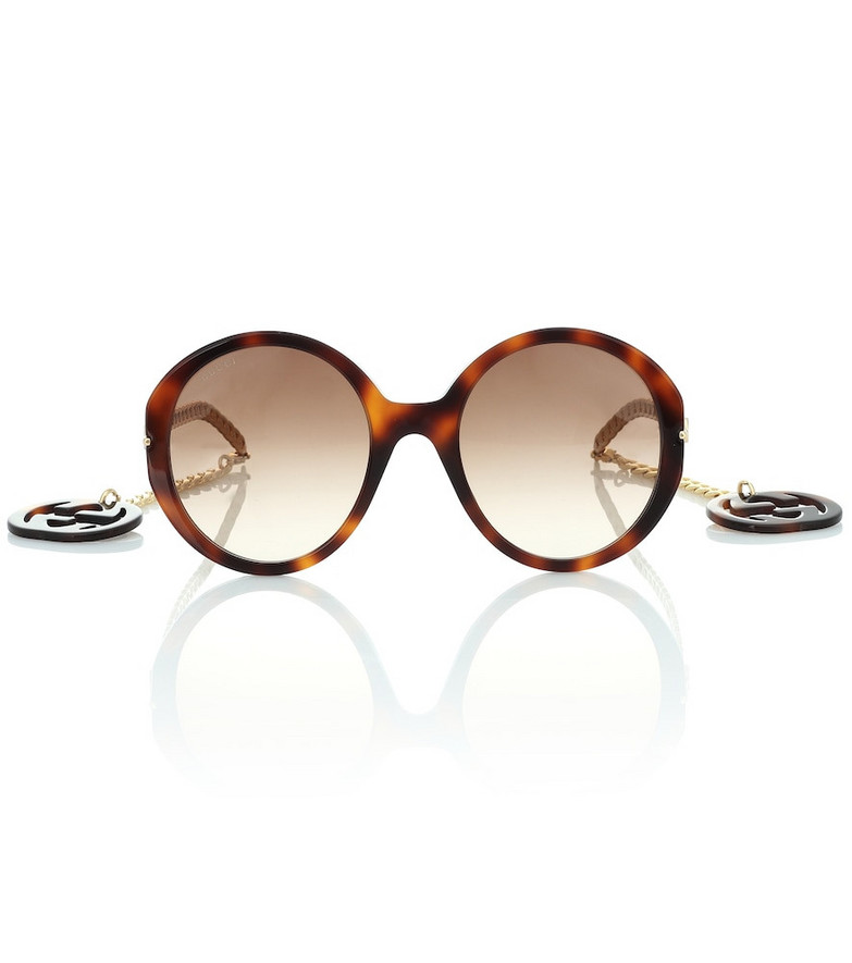 Gucci Round sunglasses with GG charms in brown