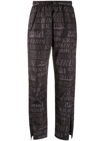 Kirin logo-print slit trousers in black
