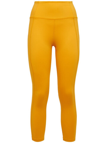 GIRLFRIEND COLLECTIVE High-rise 7/8 Compression Leggings in gold / yellow