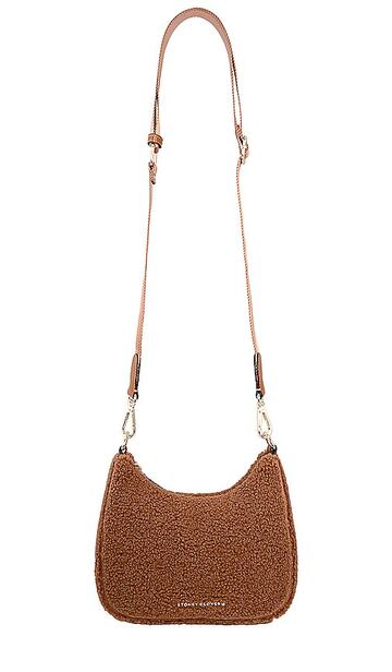 stoney clover lane sherpa curved crossbody bag in brown