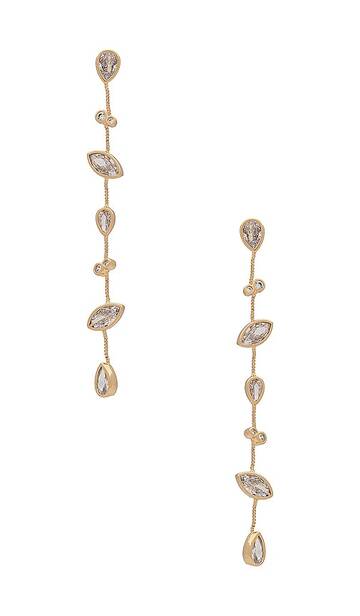 ettika drip earrings in metallic gold