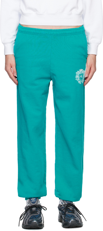 sporty & rich green elasticized lounge pants in teal / white