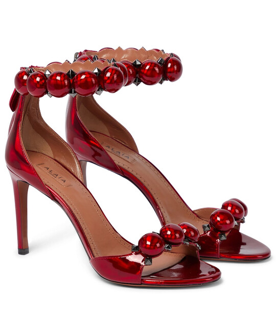 AlaÃ¯a Bombe patent leather sandals in red