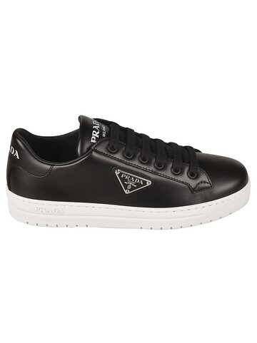 Prada Logo Plaque Sneakers in black / white