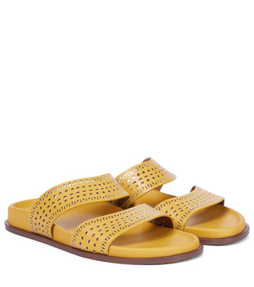 AlaÃ¯a Laser-cut leather sandals in yellow