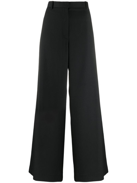 The Row palazzo pants in black