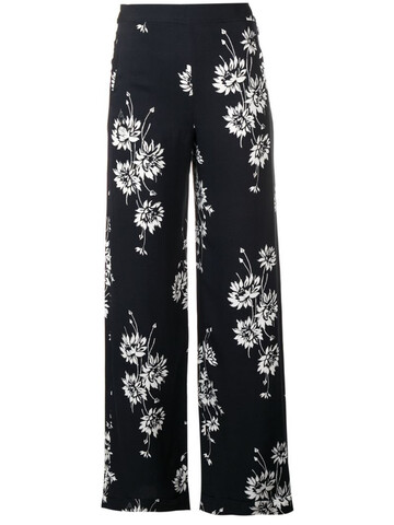 mcq swallow floral printed trousers in black