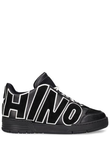 moschino logo leather mid top sneakers in black / white