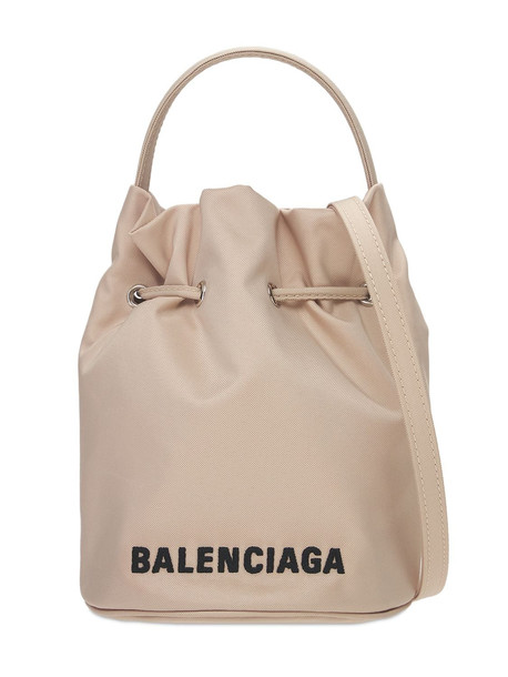BALENCIAGA Recycled Tech Bucket Bag in black / cream