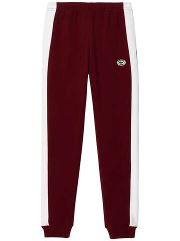 sporty & rich piqué track pants in red