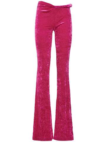 versace knotted stretch velour flared pants in fuchsia