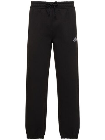 the north face essential cotton blend sweatpants in black