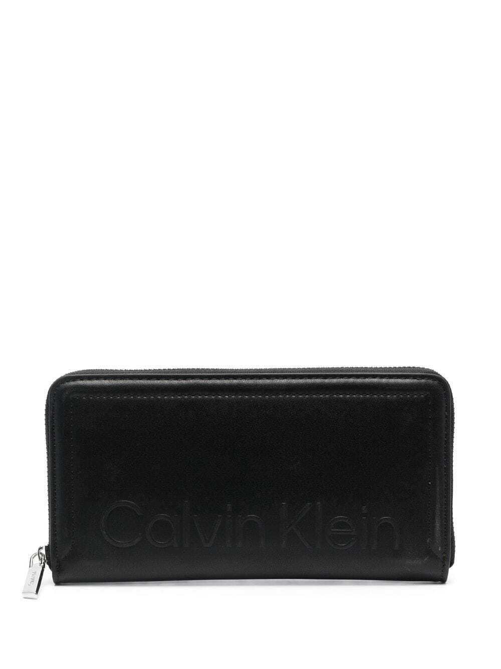 Calvin Klein debossed-logo zip-up purse - Black