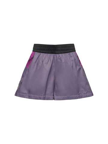 the north face tnf x shorts in purple