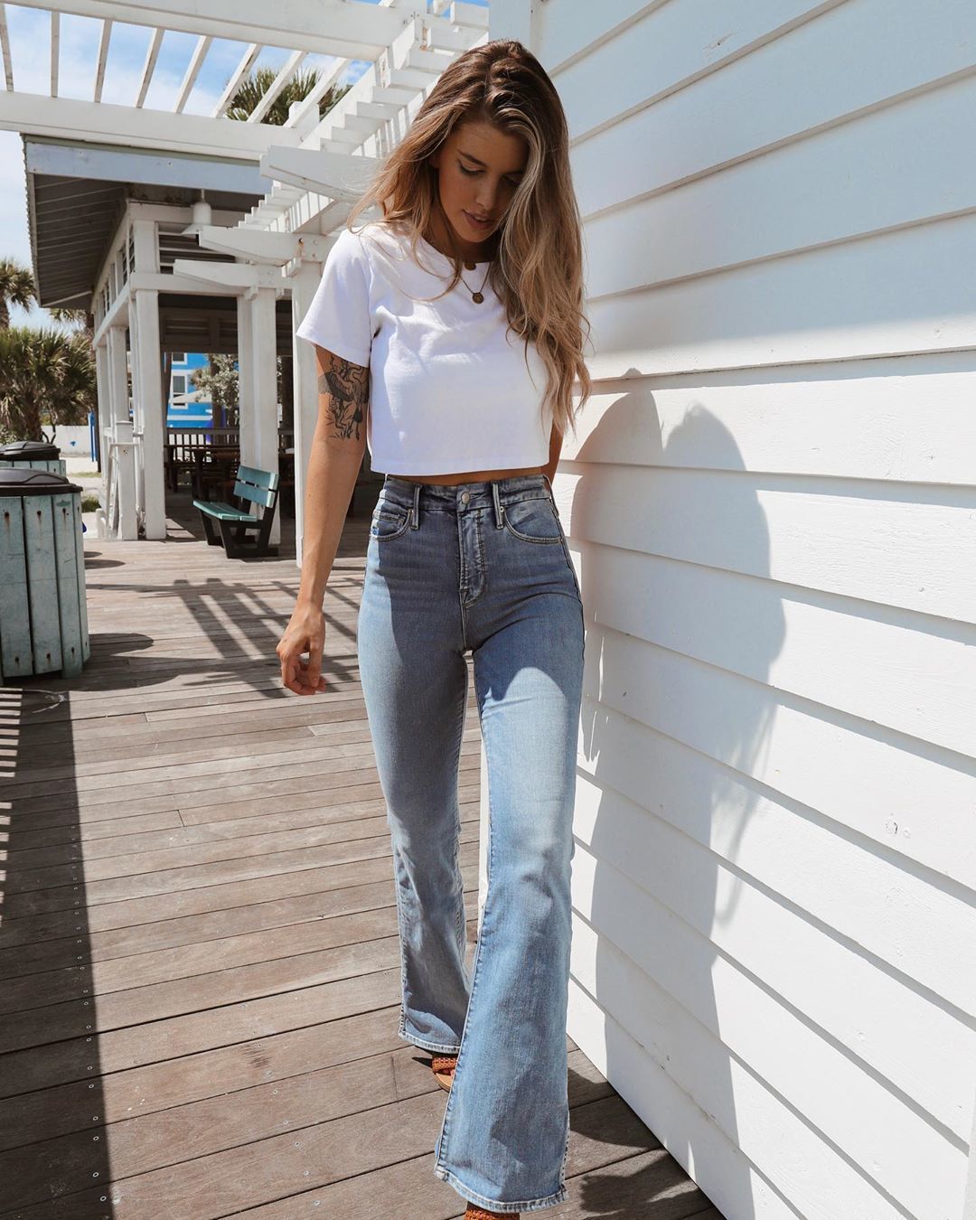 https://picture-cdn.wheretoget.com/ztnk70-l-1350x1350-jeans-flare%20jeans-high%20waisted%20jeans-sandal%20heels-white%20t%20shirt-crop%20tops.jpg